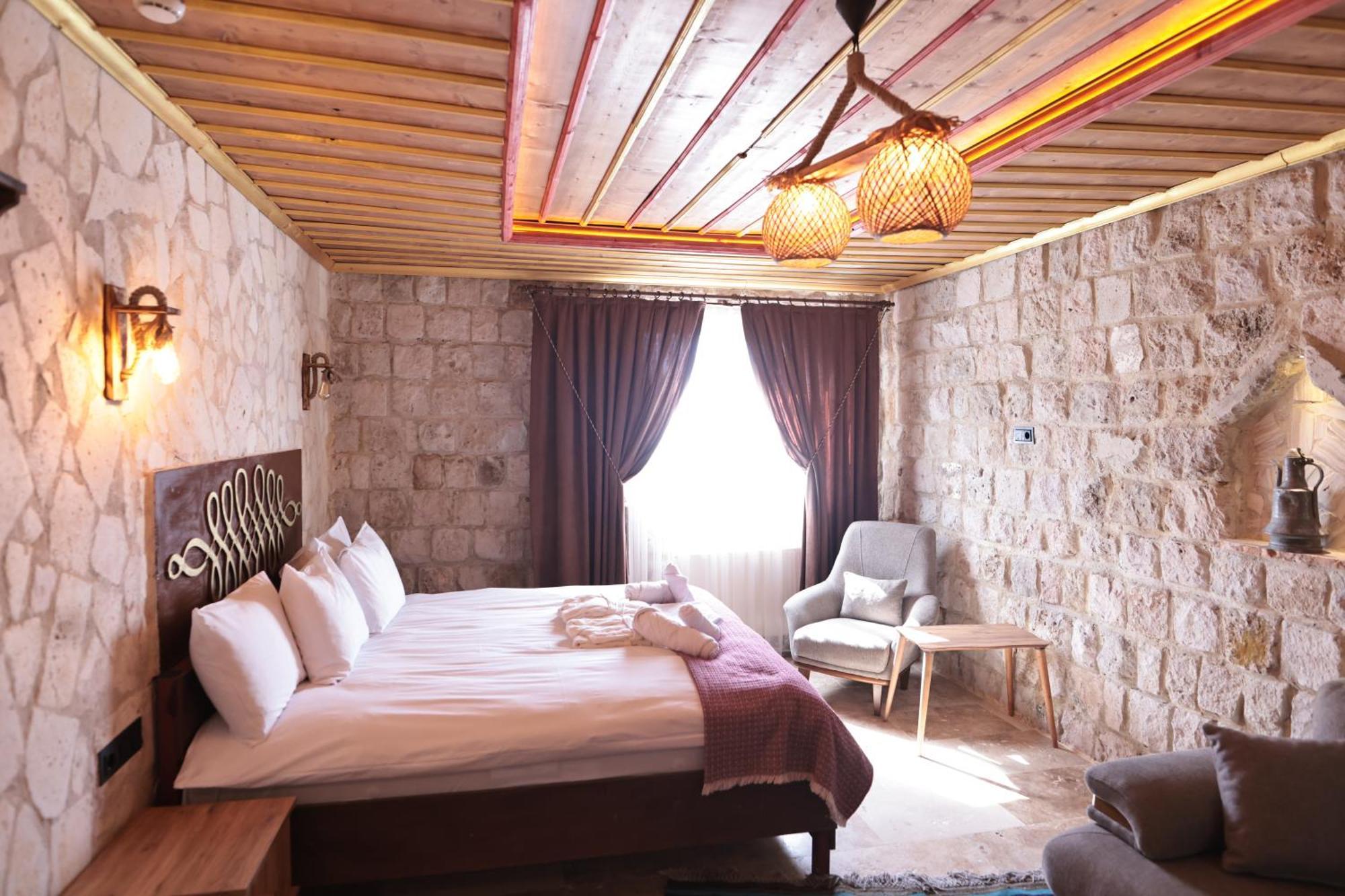 Stone Owl Otel & Restaurant Üchisar Bagian luar foto