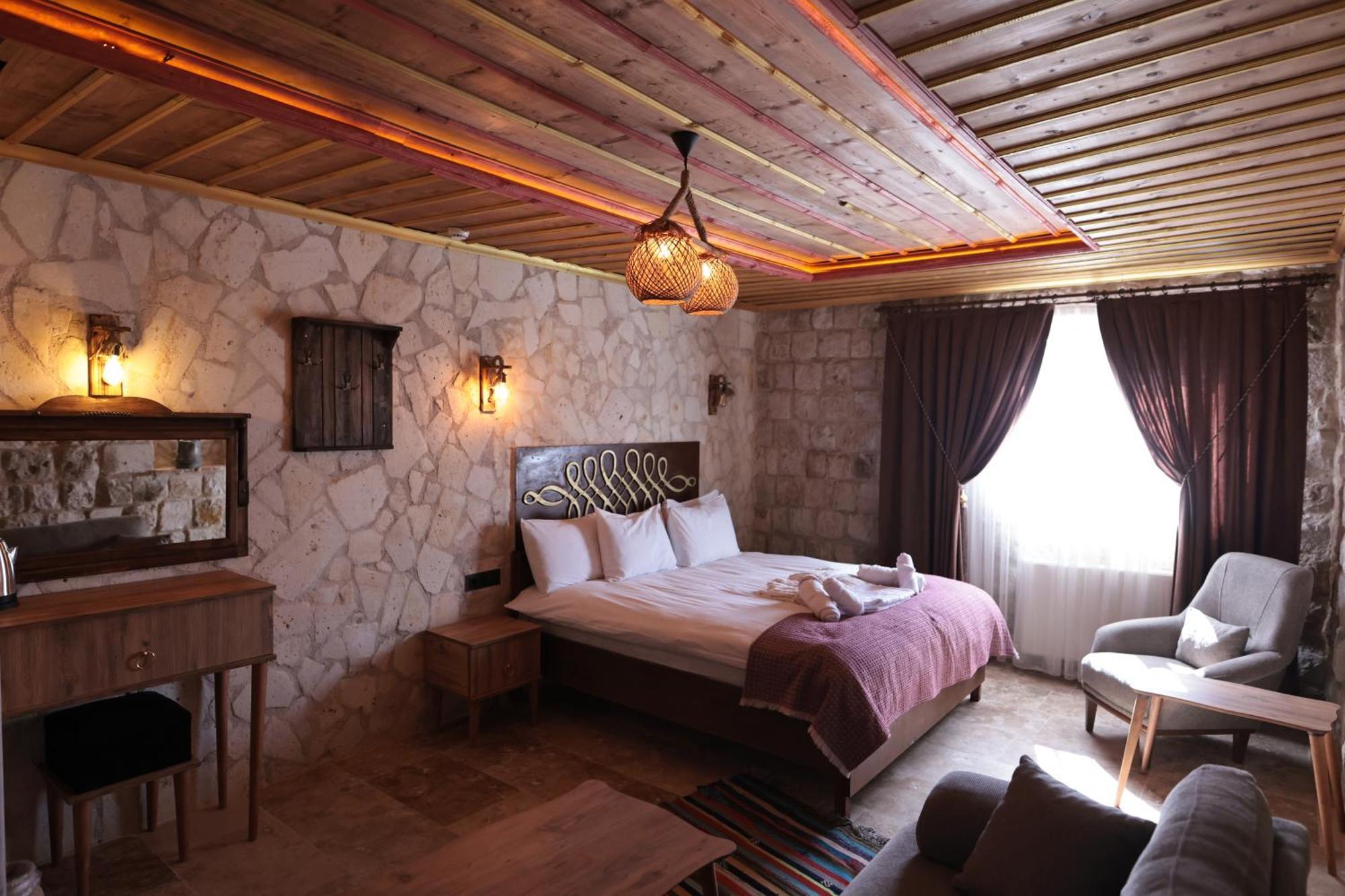 Stone Owl Otel & Restaurant Üchisar Bagian luar foto