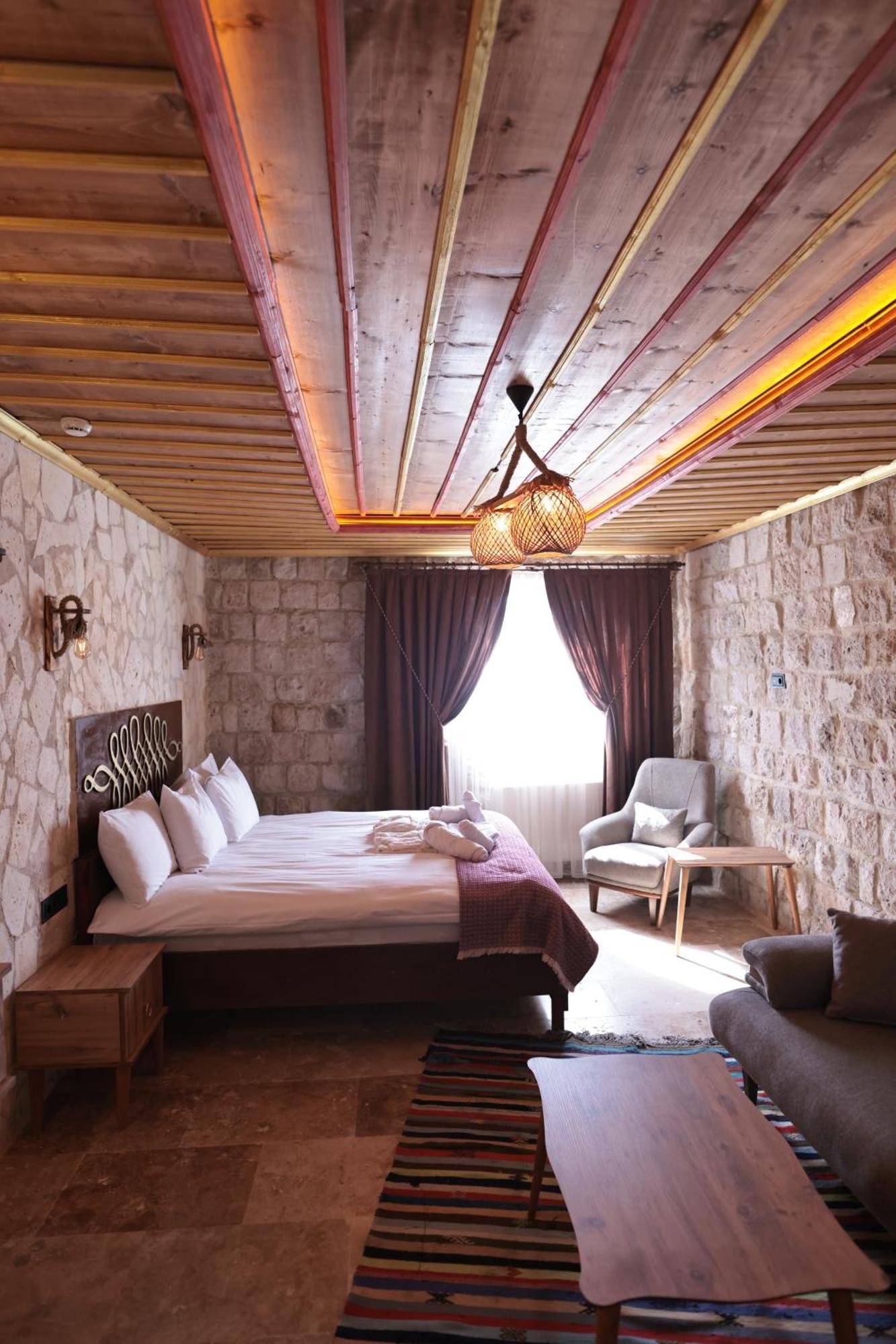 Stone Owl Otel & Restaurant Üchisar Bagian luar foto
